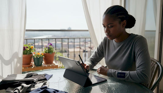 Woman designing developer apparel at home